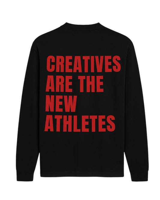 CREATIVES ARE THE NEW ATHLETES OVERSIZED LONG SLEEVED SLOGAN TEE